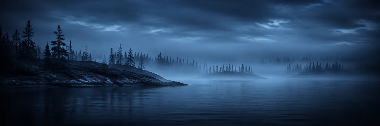 Northern mist rolling across a rugged shoreline